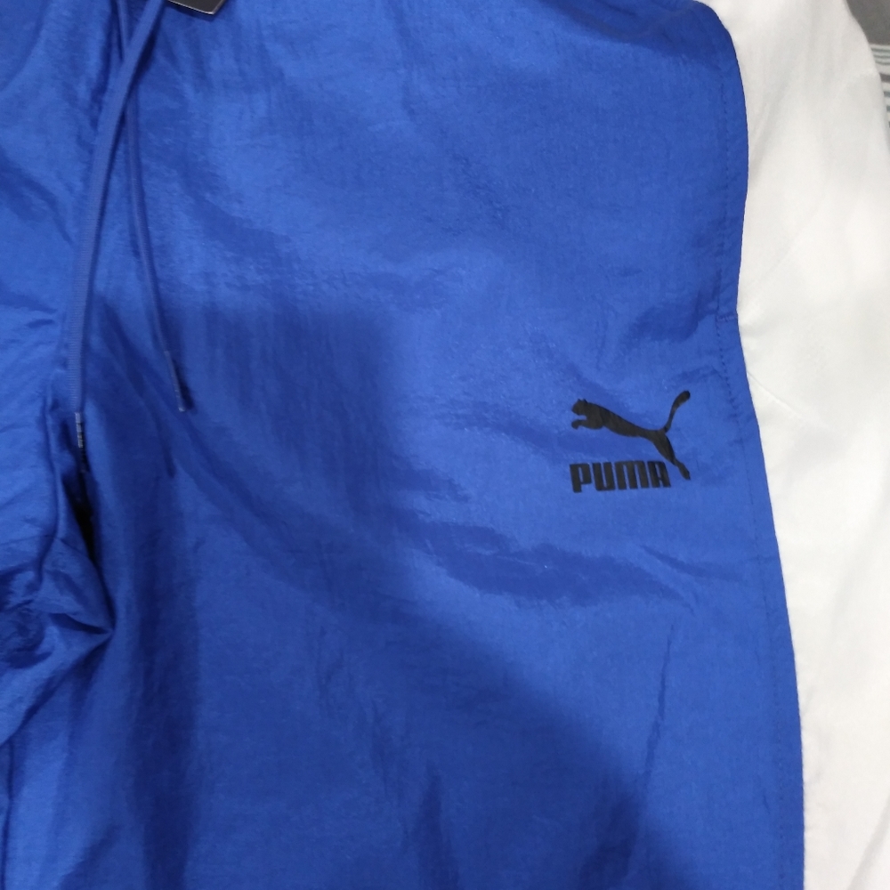 Puma wind breaker sweats, size large